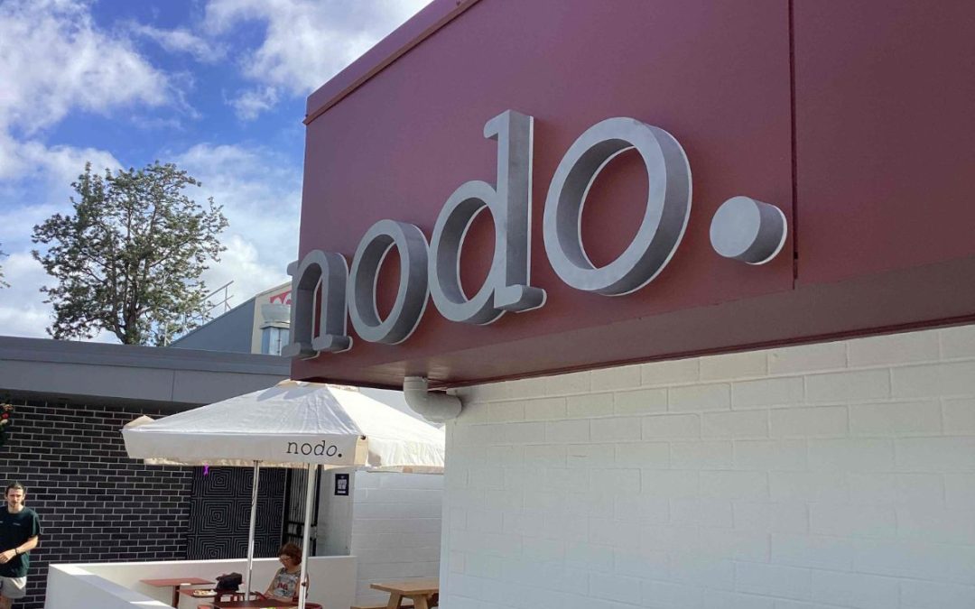 How Local Businesses Boosted Visibility with Custom Signs